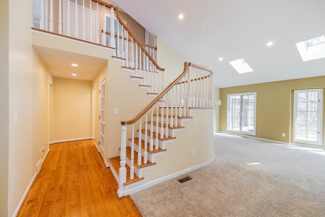 7837 Oak River Dr, Grosse Ile, MI 48138 - staircase with recessed lighting, visible vents, baseboards, and a skylight