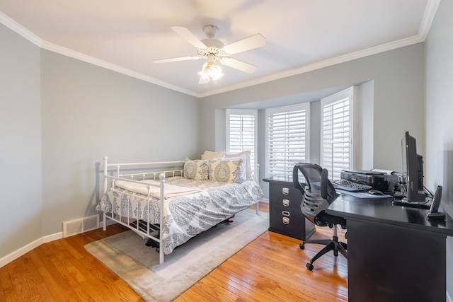 7837 Oak River Dr, Grosse Ile, MI 48138 - bedroom with wood finished floors, baseboards, ornamental molding, and visible vents