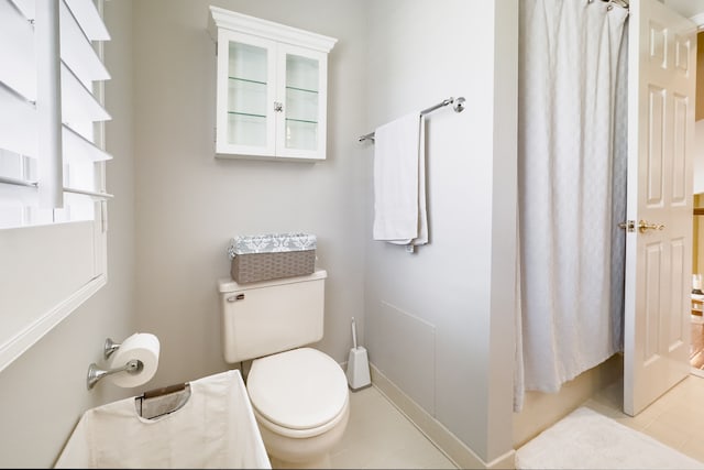 7837 Oak River Dr, Grosse Ile, MI 48138 - full bath with toilet, curtained shower, and tile patterned flooring