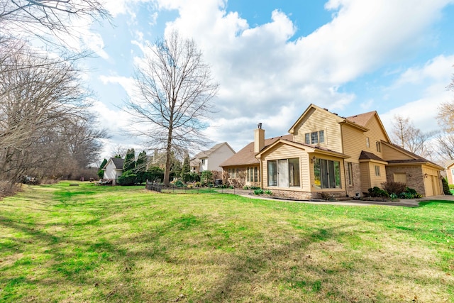 7837 Oak River Dr, Grosse Ile, MI 48138 - exterior space with an attached garage, brick siding, a chimney, and a lawn