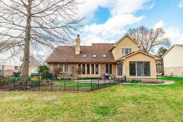 7837 Oak River Dr, Grosse Ile, MI 48138 - rear view of property featuring a yard, brick siding, fence, and a chimney