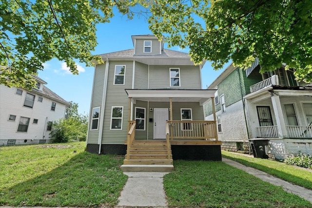 592 Leicester, Detroit, MI 48202 - traditional style home featuring a porch and a front yard