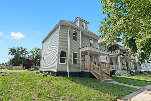 592 Leicester, Detroit, MI 48202 - traditional style home with covered porch and a front lawn