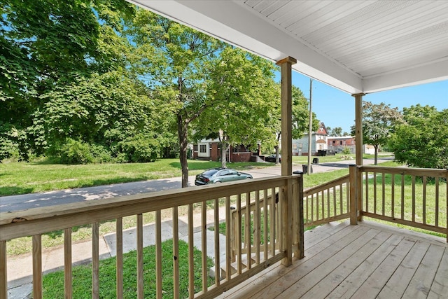 592 Leicester, Detroit, MI 48202 - wooden deck with covered porch, a residential view, and a yard