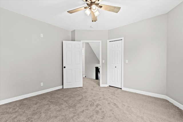 592 Leicester, Detroit, MI 48202 - unfurnished bedroom featuring carpet, a closet, baseboards, and a ceiling fan
