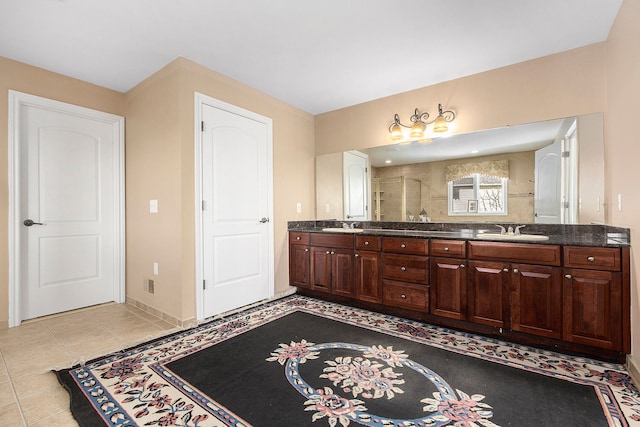 2434 Pebble Beach Dr, Oakland, MI 48363 - bathroom with tiled shower, double vanity, baseboards, and a sink
