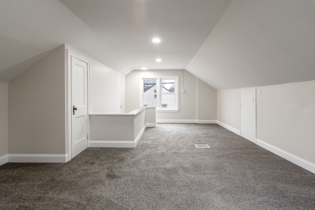 9661 Asbury Park, Detroit, MI 48227 - bonus room with visible vents, baseboards, carpet, and lofted ceiling