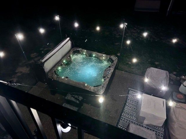 4117 Avery Rd, Lake Orion, MI 48359 - exterior space featuring an outdoor hot tub
