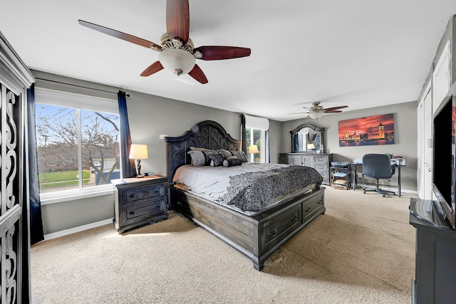 11151 Brougham Dr, Sterling Heights, MI 48312 - bedroom featuring light colored carpet, baseboards, and a ceiling fan