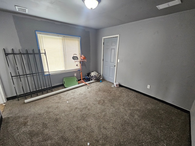 494 Polk Ave, River Rouge, MI 48218 - carpeted spare room featuring baseboards and visible vents
