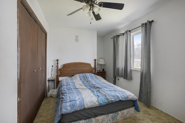 bedroom with a closet and a ceiling fan
