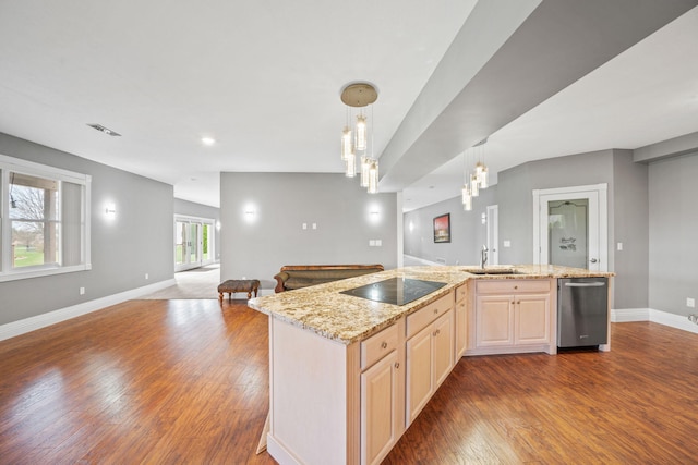 kitchen featuring visible vents, wood finished floors, open floor plan, black electric stovetop, and baseboards