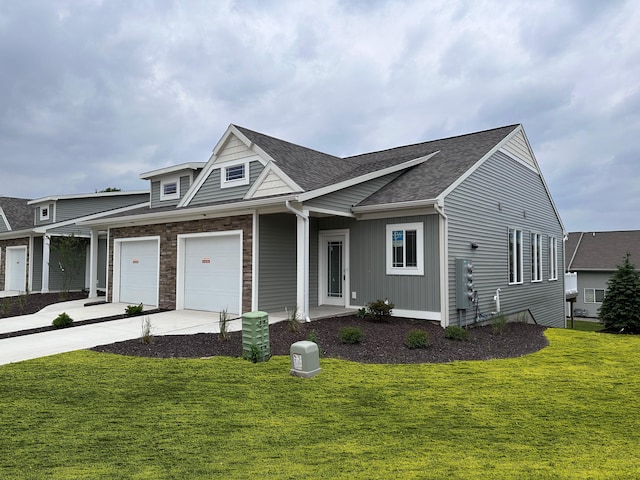 1209 Madera Ct SW, Byron Center, MI 49315 - view of front of home featuring concrete driveway, a front lawn, roof with shingles, and board and batten siding