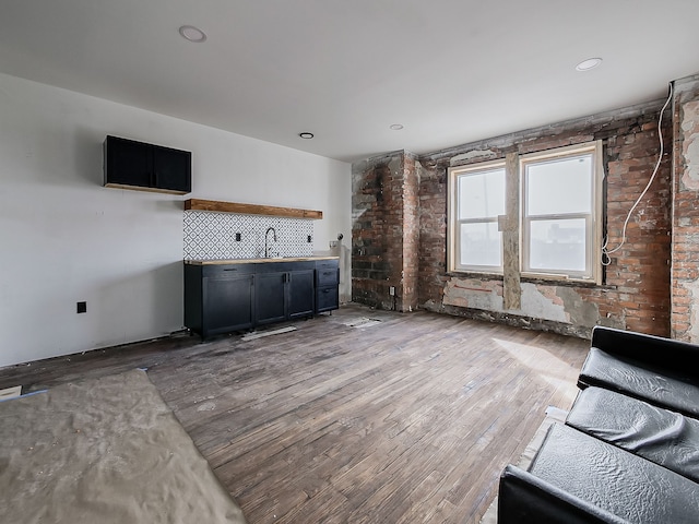 11765 Glenfield St, Detroit, MI 48213 - unfurnished living room with light wood-style flooring and a sink