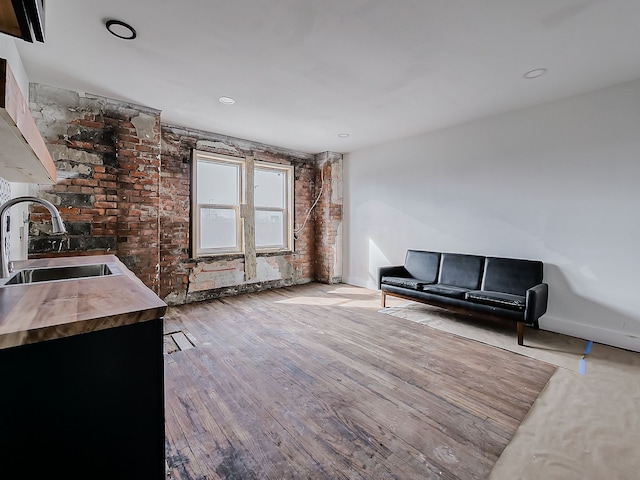 11765 Glenfield St, Detroit, MI 48213 - living area with wood finished floors and baseboards