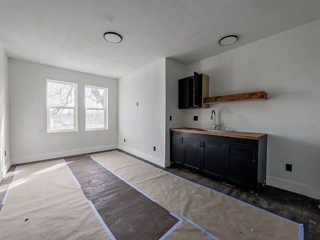11765 Glenfield St, Detroit, MI 48213 - interior space featuring dark wood-style flooring, a sink, and baseboards