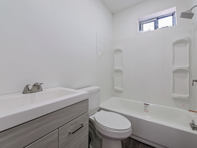 11765 Glenfield St, Detroit, MI 48213 - bathroom featuring washtub / shower combination, toilet, and vanity