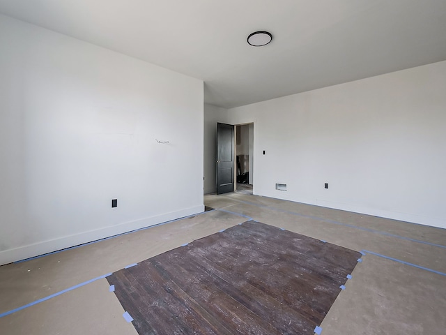 11765 Glenfield St, Detroit, MI 48213 - spare room featuring concrete floors and baseboards