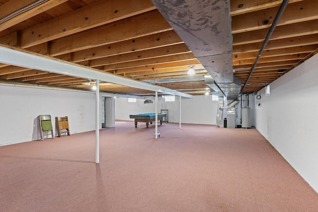 5802 Pratt Rd, Lapeer, MI 48446 - finished basement featuring billiards table, carpet, gas water heater, and heating unit