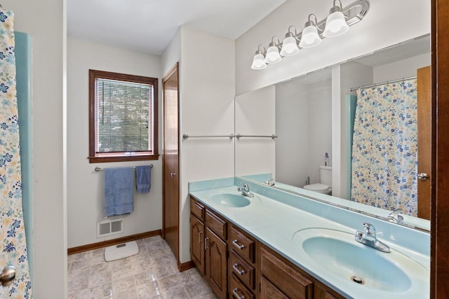 5802 Pratt Rd, Lapeer, MI 48446 - bathroom with double vanity and a shower with shower curtain