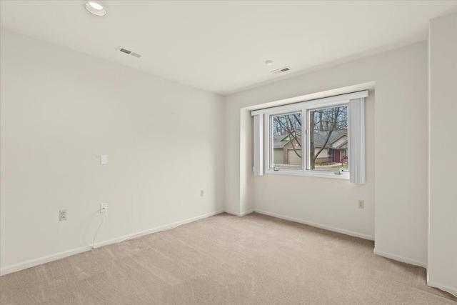 21304 Juniper Ct Unit 69, Farmington Hills, MI 48336 - carpeted spare room featuring baseboards and recessed lighting