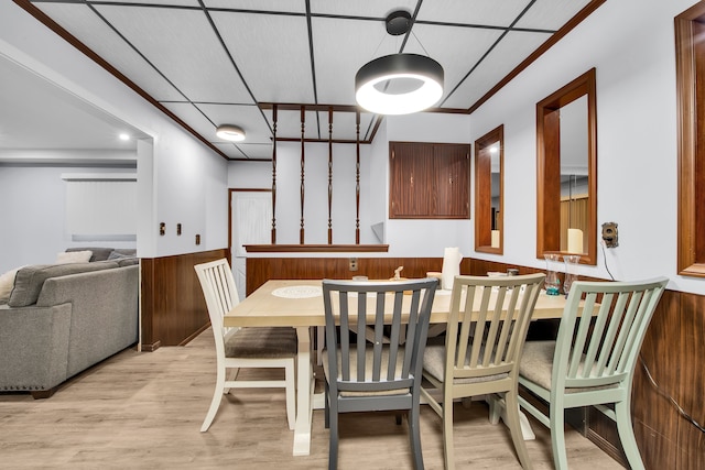 32334 Gloede Dr, Warren, MI 48088 - dining area featuring light wood-style flooring and a wainscoted wall