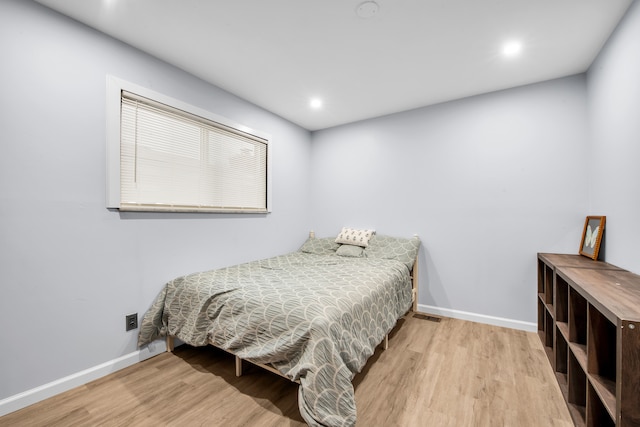 32334 Gloede Dr, Warren, MI 48088 - bedroom featuring baseboards, recessed lighting, and wood finished floors