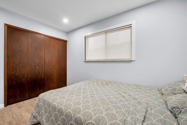 32334 Gloede Dr, Warren, MI 48088 - bedroom featuring a closet, wood finished floors, and recessed lighting