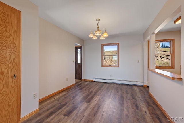 1993 Wamplers Heights Dr, Brooklyn, MI 49230 - unfurnished dining area featuring baseboard heating, plenty of natural light, a chandelier, and dark wood-style floors