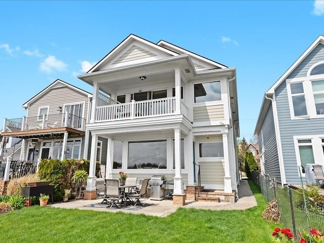 2011 W Lake Dr, Novi, MI 48377 - rear view of property with a balcony, a patio area, and entry steps