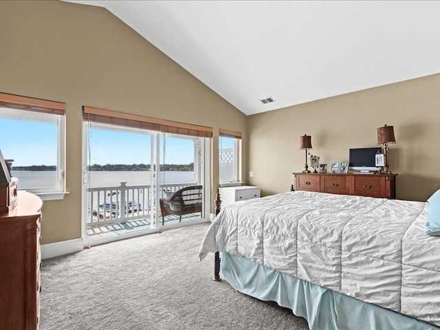 2011 W Lake Dr, Novi, MI 48377 - bedroom with access to exterior, carpet floors, and high vaulted ceiling