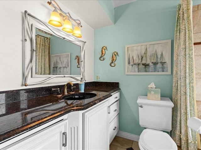 2011 W Lake Dr, Novi, MI 48377 - full bath featuring vanity, toilet, and tile patterned flooring