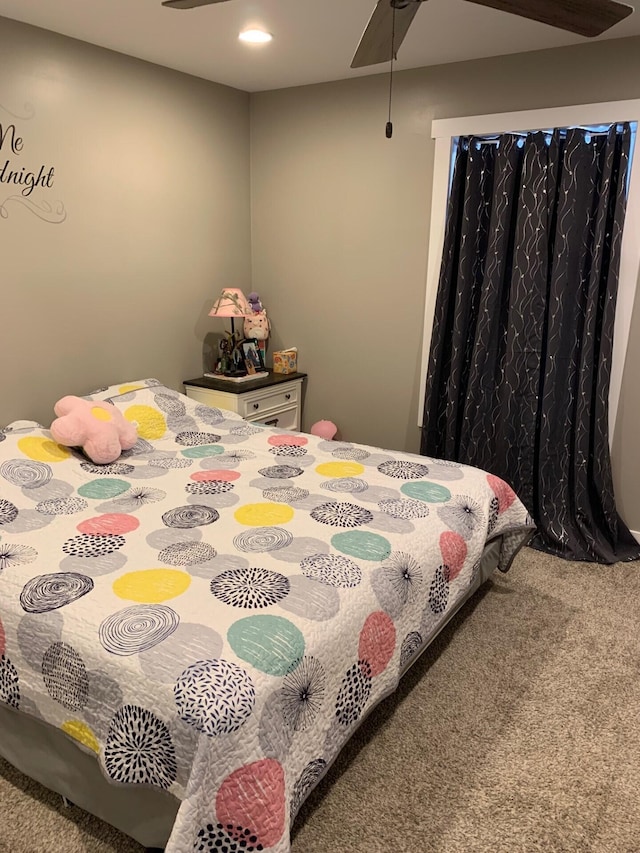 carpeted bedroom featuring recessed lighting