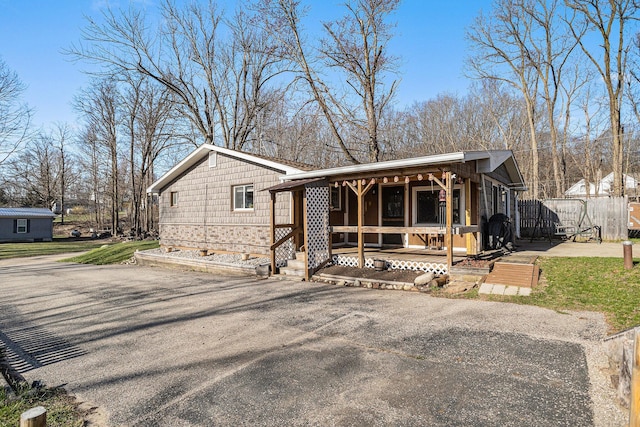 view of front of property featuring covered porch