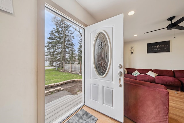 foyer featuring recessed lighting, plenty of natural light, light wood-type flooring, and a ceiling fan