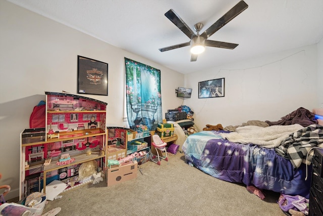 carpeted bedroom with a ceiling fan