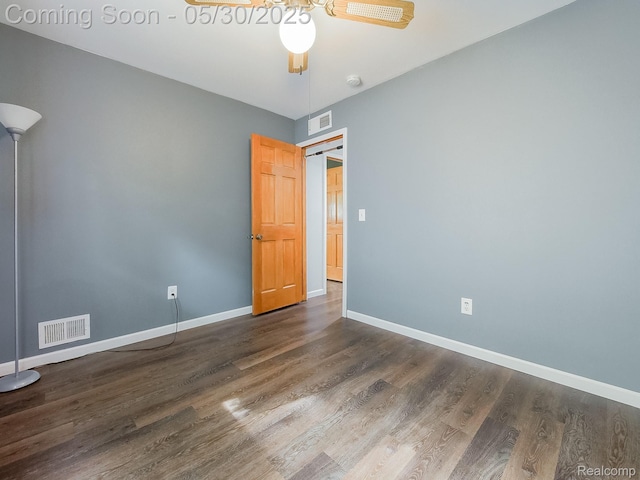 45 E George Ave, Hazel Park, MI 48030 - unfurnished room with dark wood finished floors, baseboards, and a ceiling fan