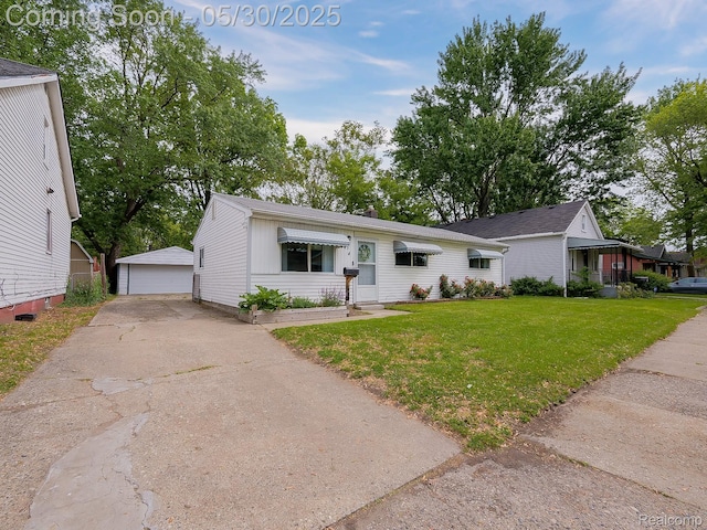 45 E George Ave, Hazel Park, MI 48030 - view of front of property featuring a front lawn, an outdoor structure, and a detached garage