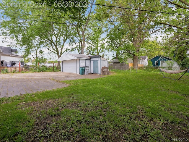 45 E George Ave, Hazel Park, MI 48030 - view of yard with an outbuilding and a garage