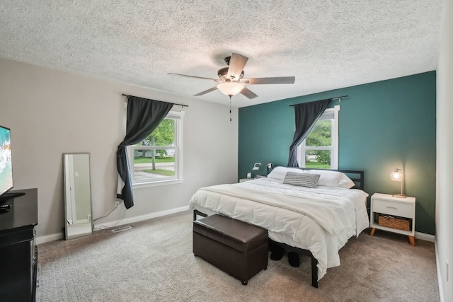 49212 Fuller Rd, Chesterfield, MI 48051 - carpeted bedroom with a textured ceiling, baseboards, and ceiling fan