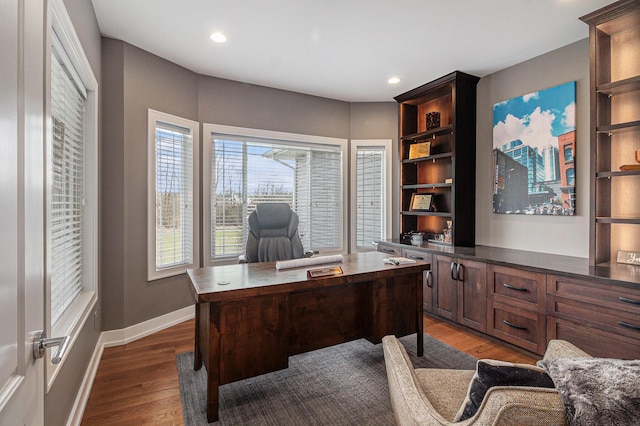 office space with dark wood-style flooring, baseboards, and recessed lighting