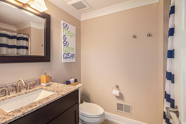 bathroom with visible vents, toilet, vanity, and baseboards
