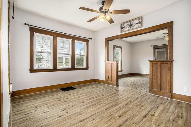 249 Wentworth Ave, Battle Creek, MI 49015 - unfurnished room with light wood-style floors, visible vents, baseboards, and a ceiling fan