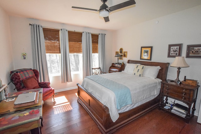 bedroom featuring ceiling fan, baseboards, and hardwood / wood-style floors
