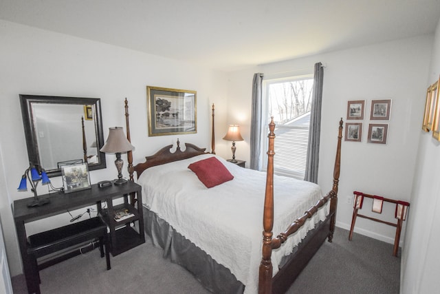 bedroom with carpet floors and baseboards