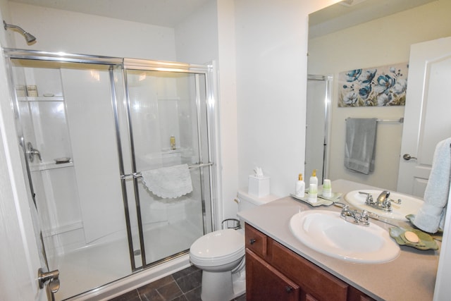 1068 Spring Trl, Brighton, MI 48116 - bathroom featuring a shower stall, vanity, and toilet