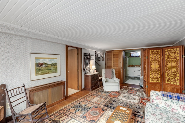 48814 Gyde Rd, Canton, MI 48187 - living room featuring radiator and wood finished floors