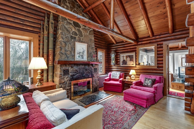 48814 Gyde Rd, Canton, MI 48187 - living area featuring wooden ceiling, lofted ceiling with beams, rustic walls, hardwood / wood-style flooring, and a fireplace