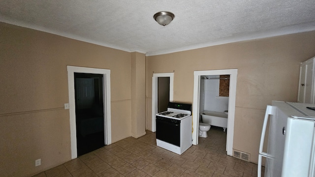 4107 N Campbell St, Detroit, MI 48210 - kitchen featuring a textured ceiling, light countertops, white gas stove, and visible vents