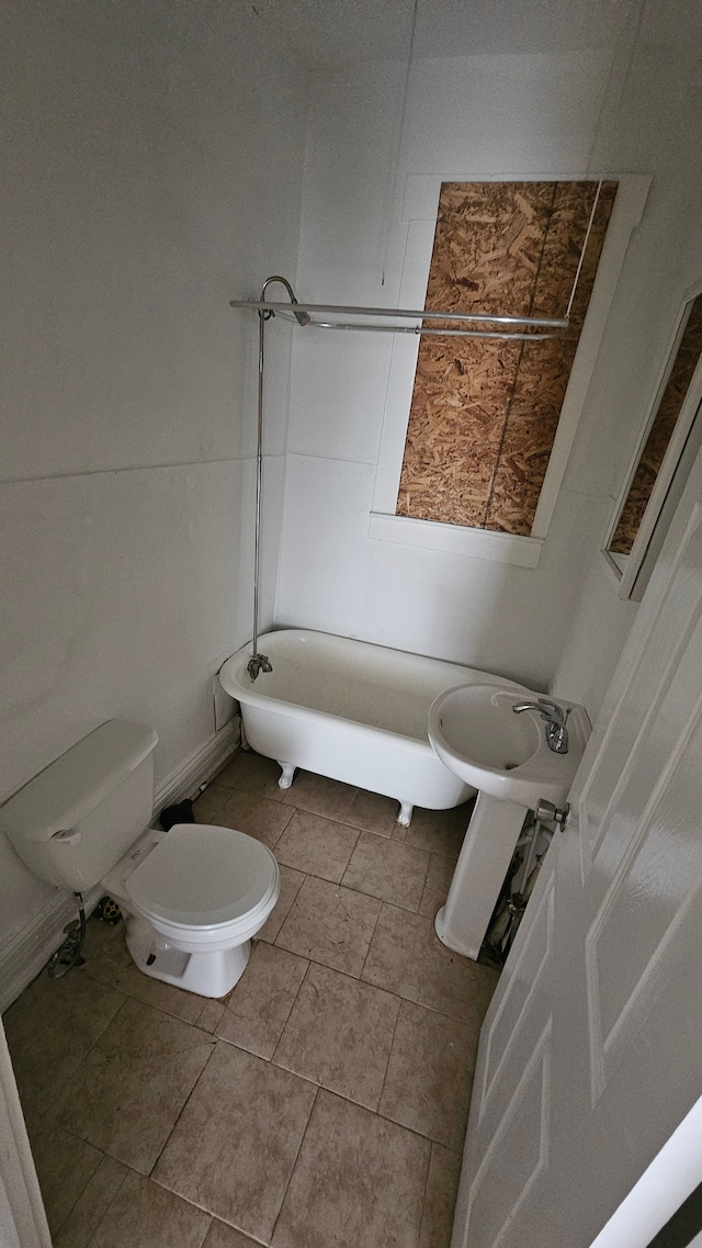 4107 N Campbell St, Detroit, MI 48210 - bathroom with tile patterned flooring, a sink, and toilet